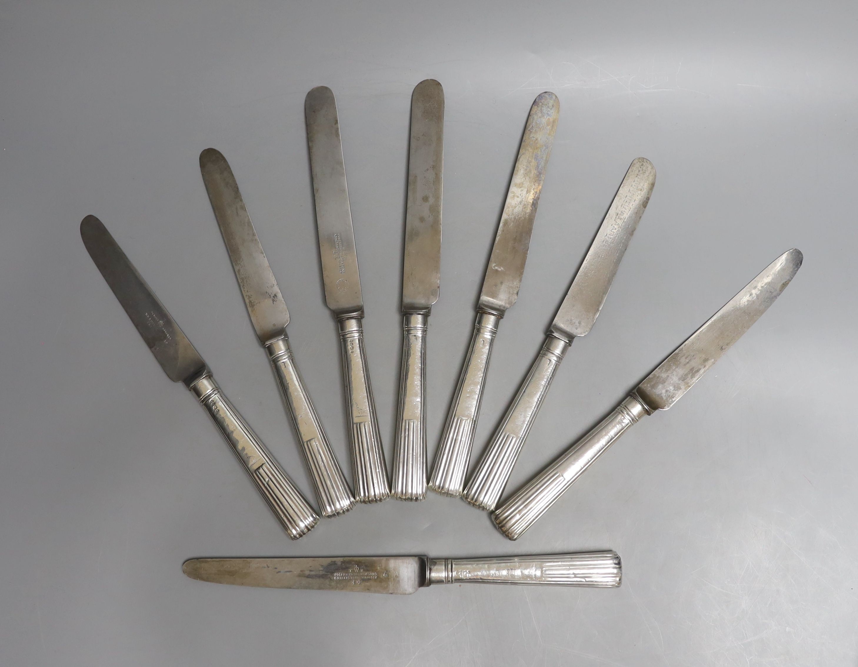 A set of eight William IV silver handled steel table knives, Francis Higgins II, London, 1835, 27.8cm (a.f.).